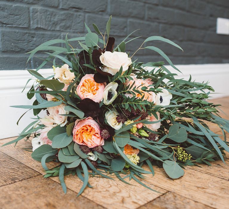 Floral and eucalyptus wedding bouquet at intimate celebration