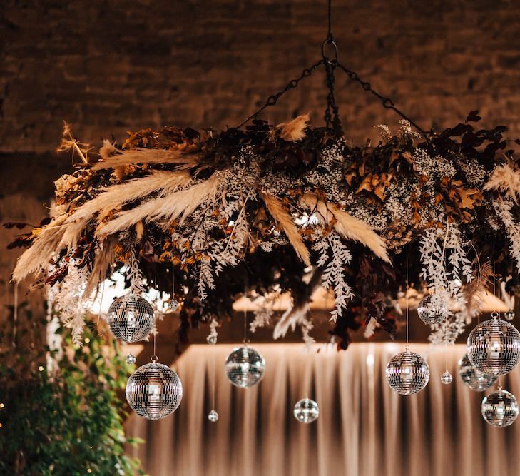 Pampas grass, dried flower and glitter ball wedding decor