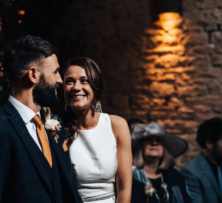 Bride and groom during October wedding ceremony