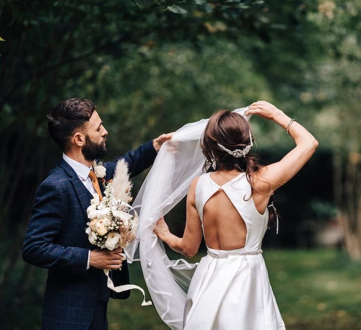 Open back bride dress with pockets from Jesus Peiro