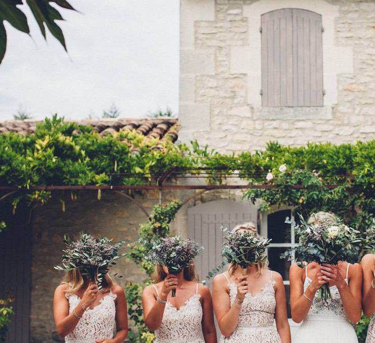 Greenery Wedding Bouquets | Bridal Party | Bride in Needle &amp; Thread Gown | Bridesmaids in Nude Lace ASOS Dresses | Outdoor Destination Wedding at Le Peit Hameau Wedding Venue Provence, South of France Planned by By Mademoiselle | Lovestruck Photography