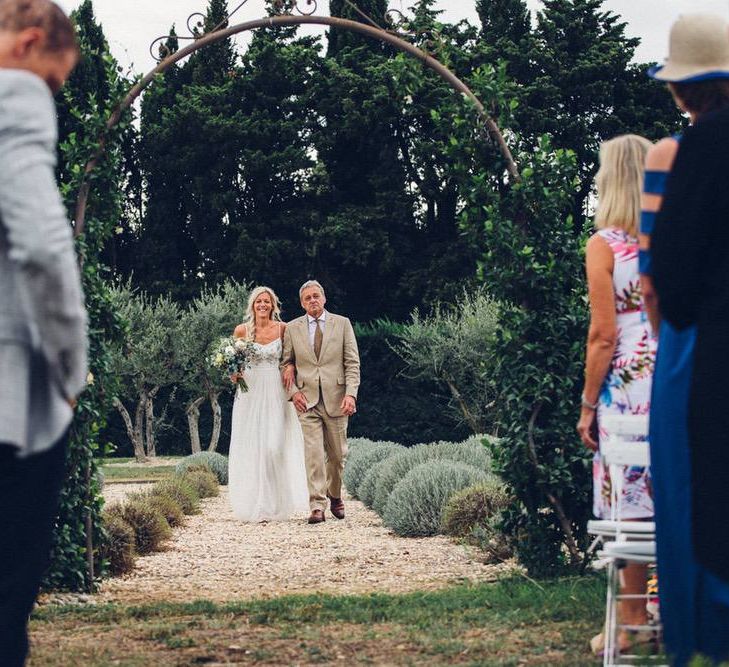 Wedding Ceremony Bridal Entrance in Needle &amp; Thread Wedding Dress | Outdoor Destination Wedding at Le Peit Hameau Wedding Venue Provence, South of France Planned by By Mademoiselle | Lovestruck Photography