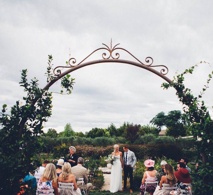 Wedding Ceremony | Bride in Needle &amp; Thread Gown | Groom in Reiss Chinos &amp; Blazer | Outdoor Destination Wedding at Le Peit Hameau Wedding Venue Provence, South of France Planned by By Mademoiselle | Lovestruck Photography