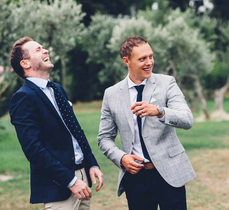 Groom in Reiss Navy Chinos &amp; Grey Check Blazer | Outdoor Destination Wedding at Le Peit Hameau Wedding Venue Provence, South of France Planned by By Mademoiselle | Lovestruck Photography