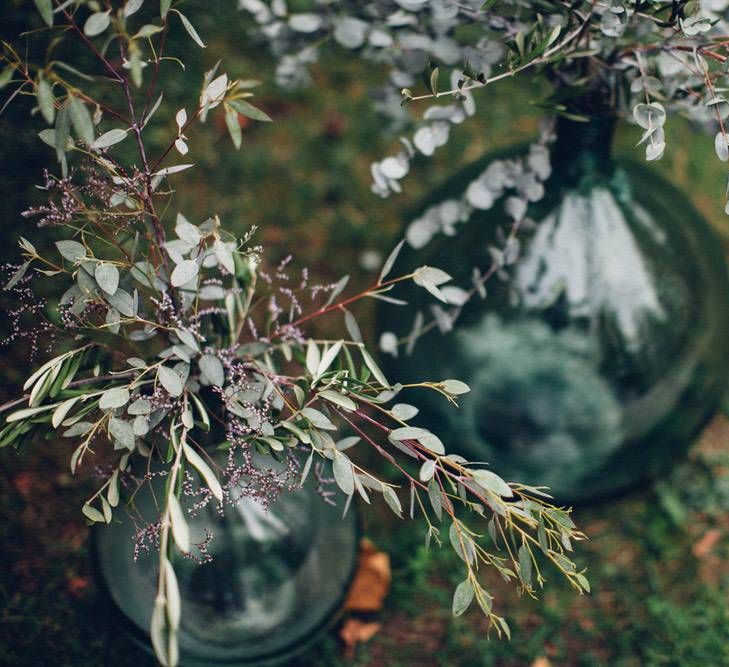 Wedding Flowers in Coloured Glass Vases | Wedding Decor | Outdoor Destination Wedding at Le Peit Hameau Wedding Venue Provence, South of France Planned by By Mademoiselle | Lovestruck Photography