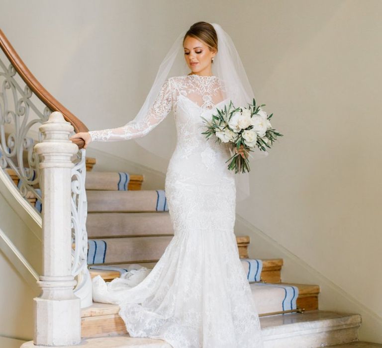 Bride in Yolan Cris Lace Wedding Dress with Long Sleeves and Fishtail Skirt