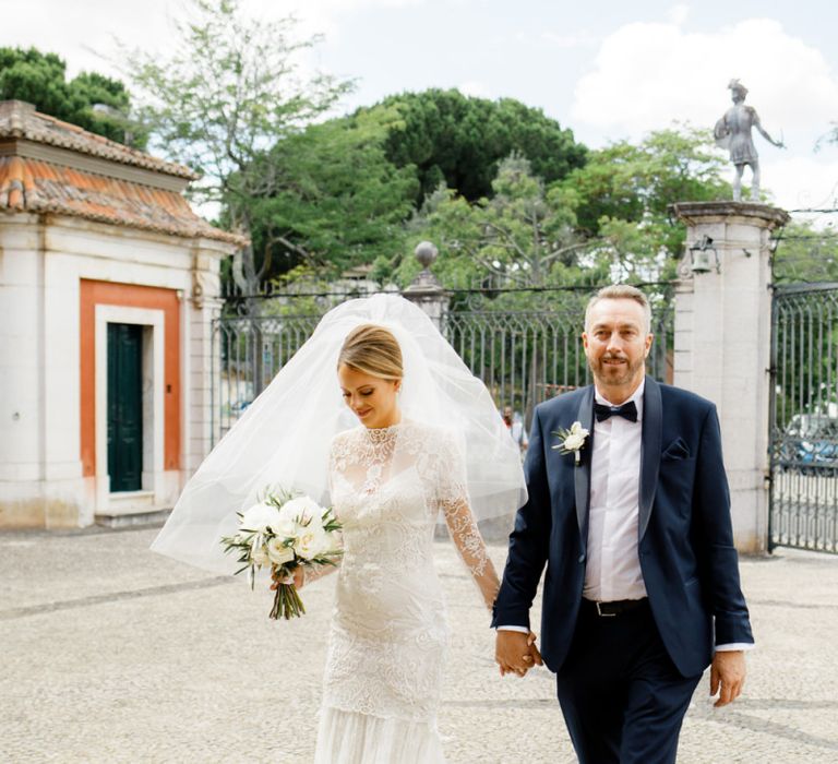 Wedding Ceremony Bridal Entrance with Bride in Lace Wedding Dress and Veil