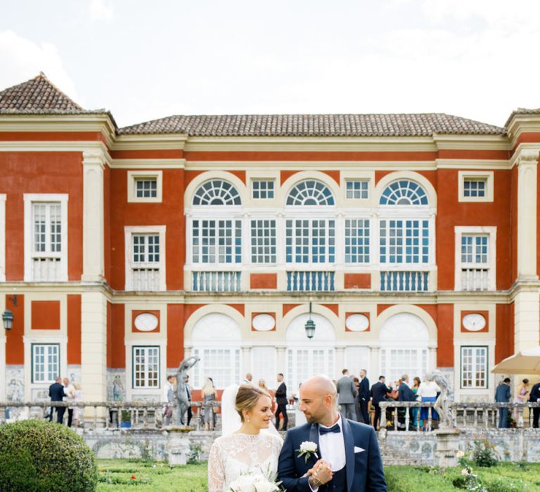 Bride and Groom Standing in Front of their Palácio Fronteira Lisbon Wedding Venue