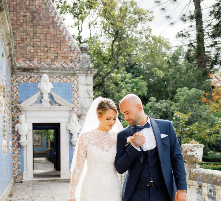 Stylish Bride and Groom in Yolan Cris Wedding Dress and Navy Suit