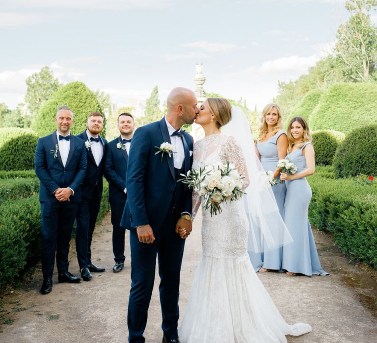 Wedding Party Portrait on Navy Suits  and Pale Blue Dresses