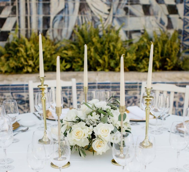 Gold Platter Place Setting, White Flower Centrepiece and Taper Candles