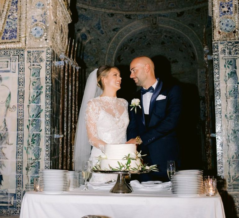 Bride and Groom Cutting the Cake