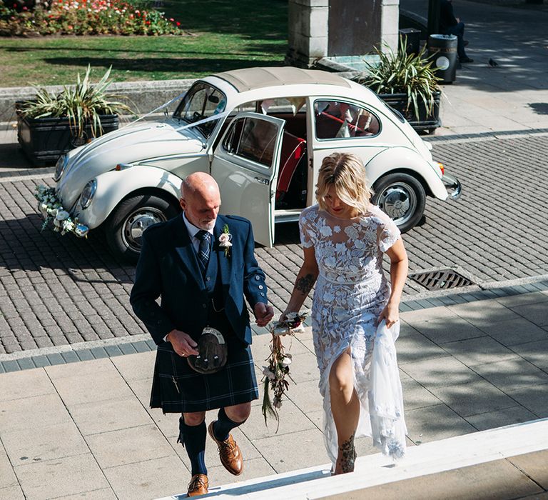 Wedding Ceremony Bridal Entrance in Vintage Beetle Wedding Car