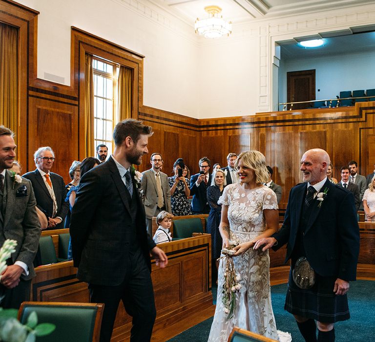 Wedding Ceremony Bridal Entrance at Hackney Town Hall in Lace Hermione De Paula Wedding Dress