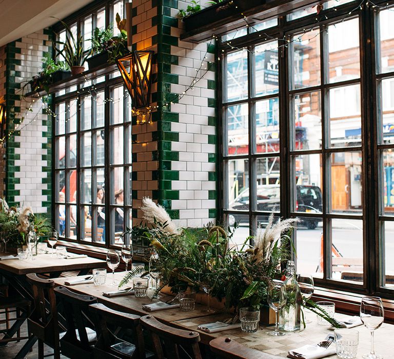 Flower Box Table Centrepieces and Fairy Lights Decorating Singer Tavern