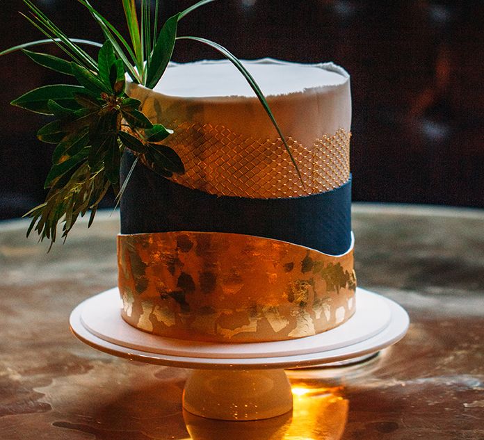 Single Tier Wedding Cake with Gold Leaf Decor  and Foliage Topper