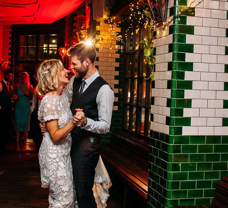 First Dance at Singer Tavern with Bride in Lace Hermione De Paula Wedding Dress and Groom in Check Ted Baker Suit