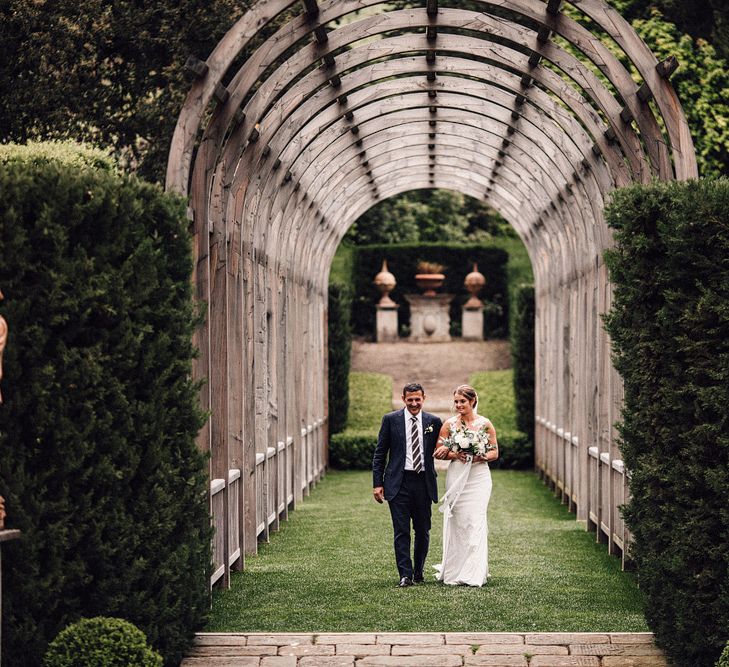 Bridal Entrance in Lace Pronovias Wedding Dress | Stylish Tuscan Wedding at Vignamaggio Planned by The Wedding Boutique Italy | Samuel Docker Photography | Paul Vann Films