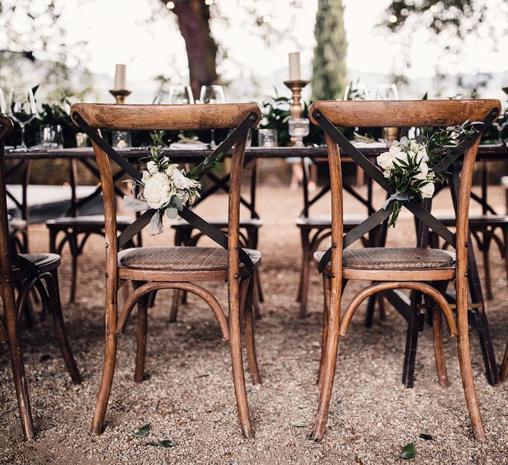 White &amp; Green Chair Back Flowers | Stylish Tuscan Wedding at Vignamaggio Planned by The Wedding Boutique Italy | Samuel Docker Photography | Paul Vann Films