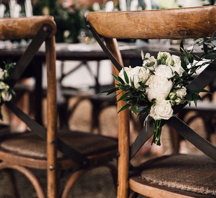 White &amp; Green Chair Back Flowers | Stylish Tuscan Wedding at Vignamaggio Planned by The Wedding Boutique Italy | Samuel Docker Photography | Paul Vann Films