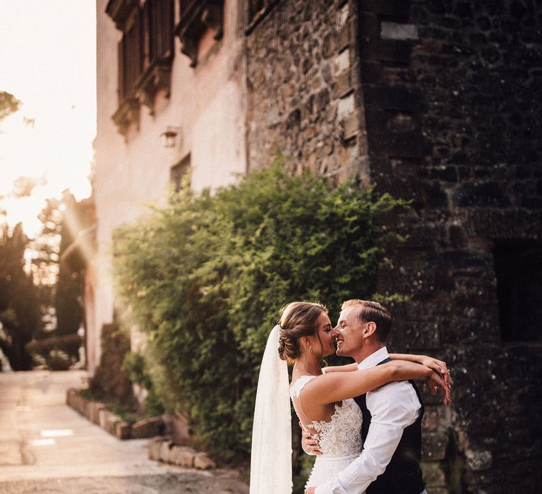 Bride in Pronovias Wedding Dress | Groom in Light Blue Suit Supply Suit | Stylish Tuscan Wedding at Vignamaggio Planned by The Wedding Boutique Italy | Samuel Docker Photography | Paul Vann Films