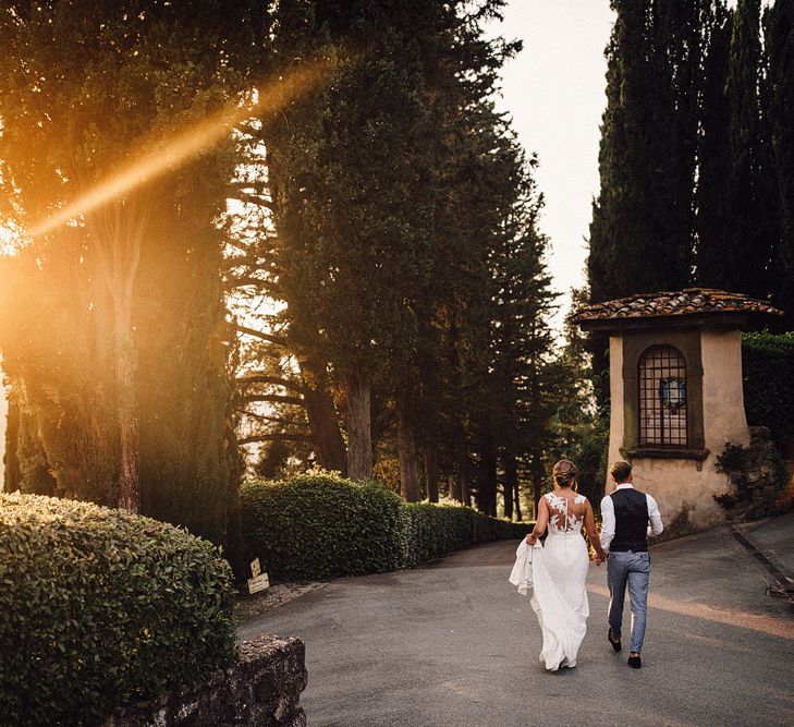 Bride in Pronovias Wedding Dress | Groom in Light Blue Suit Supply Suit | Stylish Tuscan Wedding at Vignamaggio Planned by The Wedding Boutique Italy | Samuel Docker Photography | Paul Vann Films