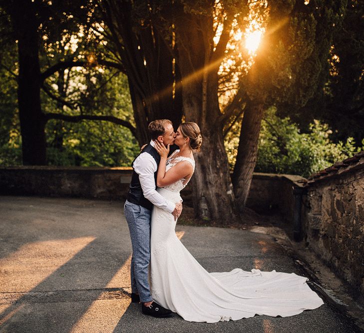 Sunset Portrait | Bride in Pronovias Wedding Dress | Groom in Light Blue Suit Supply Suit | Stylish Tuscan Wedding at Vignamaggio Planned by The Wedding Boutique Italy | Samuel Docker Photography | Paul Vann Films