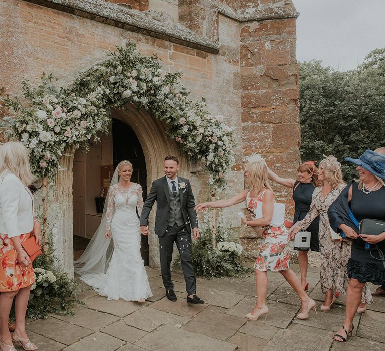 Confetti exit for bride and groom