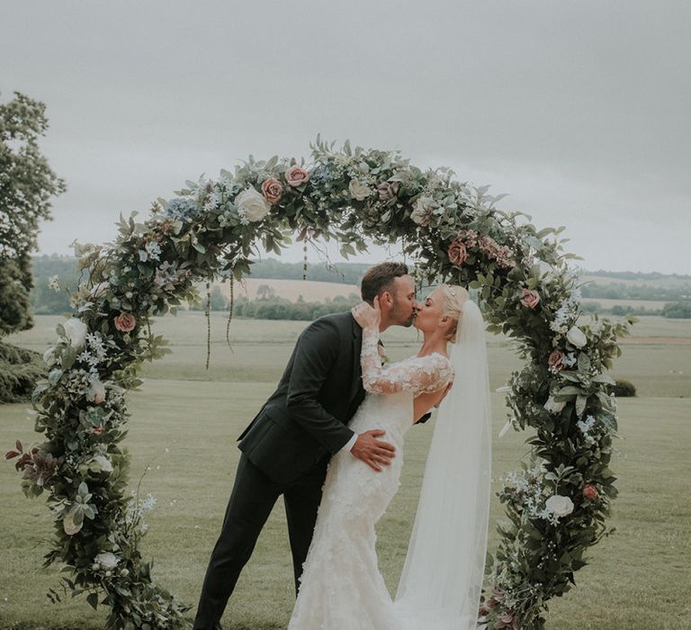 Floral moon gate at Aynhoe Park wedding