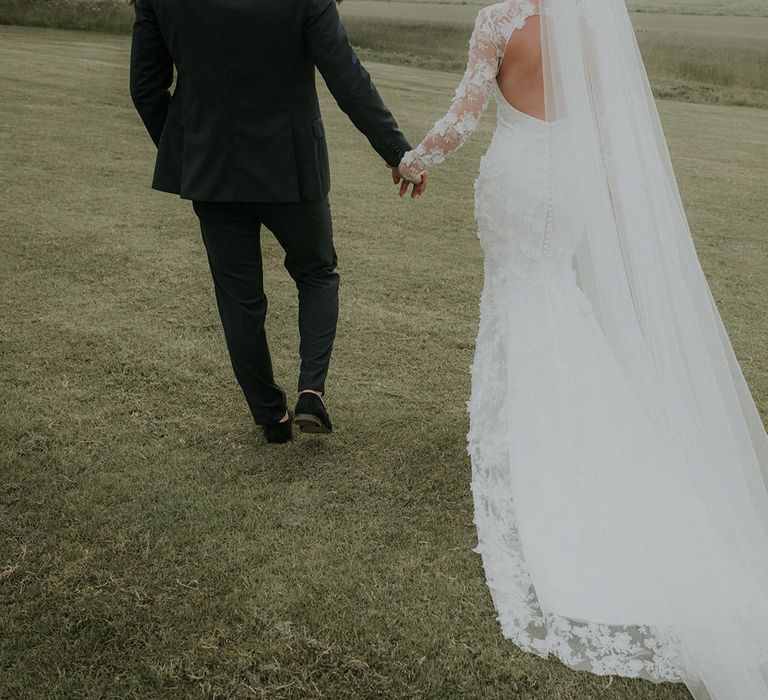 Open back Suzanne Neville wedding dress