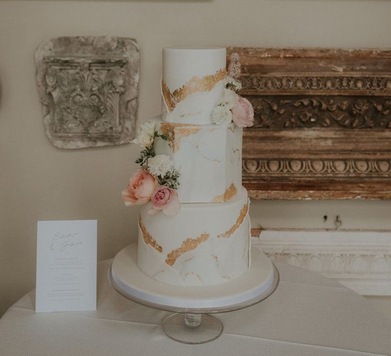 White and gold wedding cake