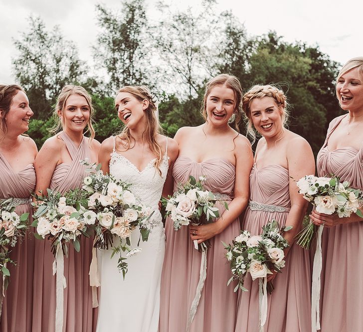 Bridesmaids In Pale Pink // Brookfield Barn Wedding Venue With Rustic Styling And Bride In Enzoani With Images From Lemonade Pictures And Film By Kitebox Films