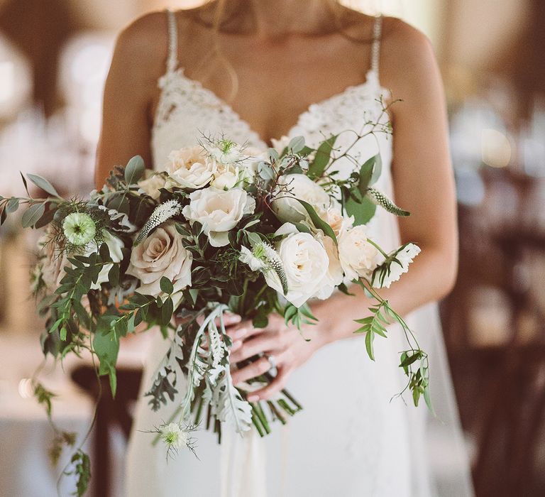 White Rose Wedding Bouquet // Brookfield Barn Wedding Venue With Rustic Styling And Bride In Enzoani With Images From Lemonade Pictures And Film By Kitebox Films