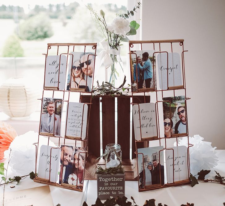 Rustic Wedding Photo Display // Brookfield Barn Wedding Venue With Rustic Styling And Bride In Enzoani With Images From Lemonade Pictures And Film By Kitebox Films