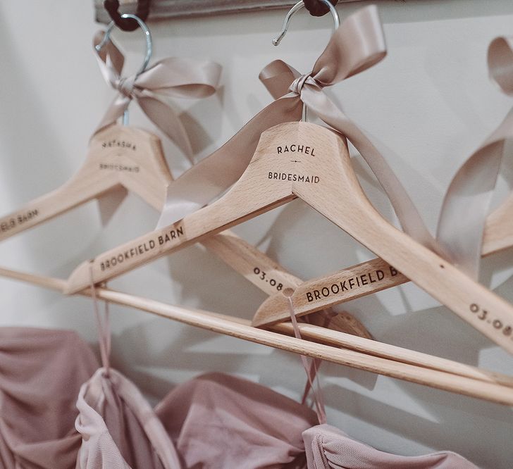 Personalised Hangers For Bridesmaids // Brookfield Barn Wedding Venue With Rustic Styling And Bride In Enzoani With Images From Lemonade Pictures And Film By Kitebox Films