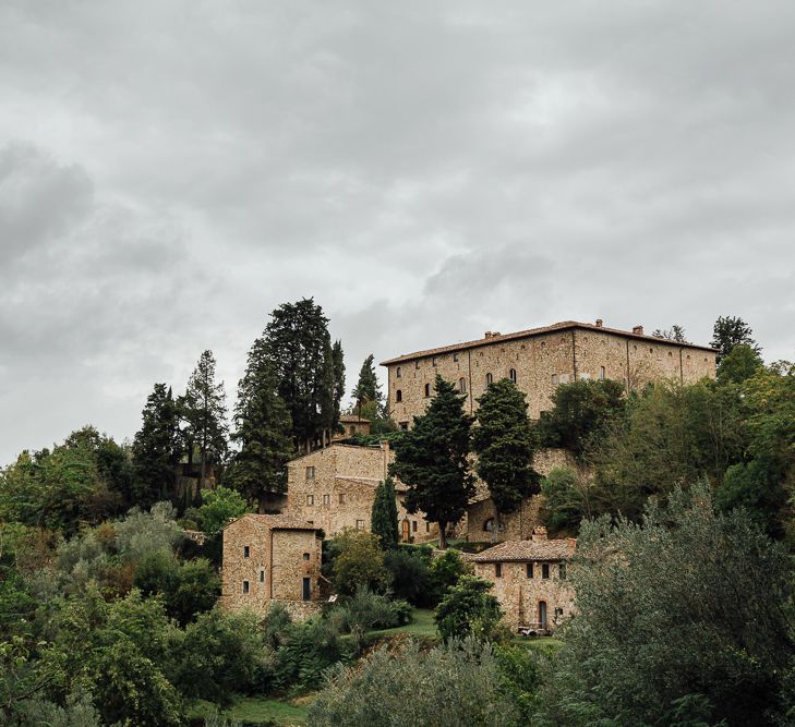 Castle Venue, Castello di Bibbione. Destination wedding in Italy. Featuring RMW The List recommended suppliers Wiskow &amp; White and Red on Blonde. Rue de Seine wedding gown with deep red chianti bridesmaid Rewritten dresses.