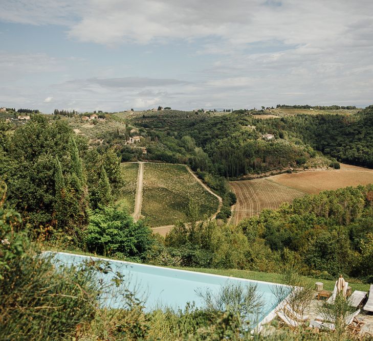 Destination wedding in Italy. Featuring RMW The List recommended suppliers Wiskow &amp; White and Red on Blonde. Rue de Seine wedding gown with deep red chianti bridesmaid Rewritten dresses.