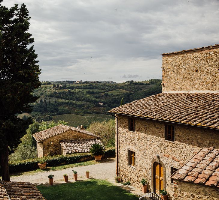 Destination wedding in Italy. Featuring RMW The List recommended suppliers Wiskow &amp; White and Red on Blonde. Rue de Seine wedding gown with deep red chianti bridesmaid Rewritten dresses.