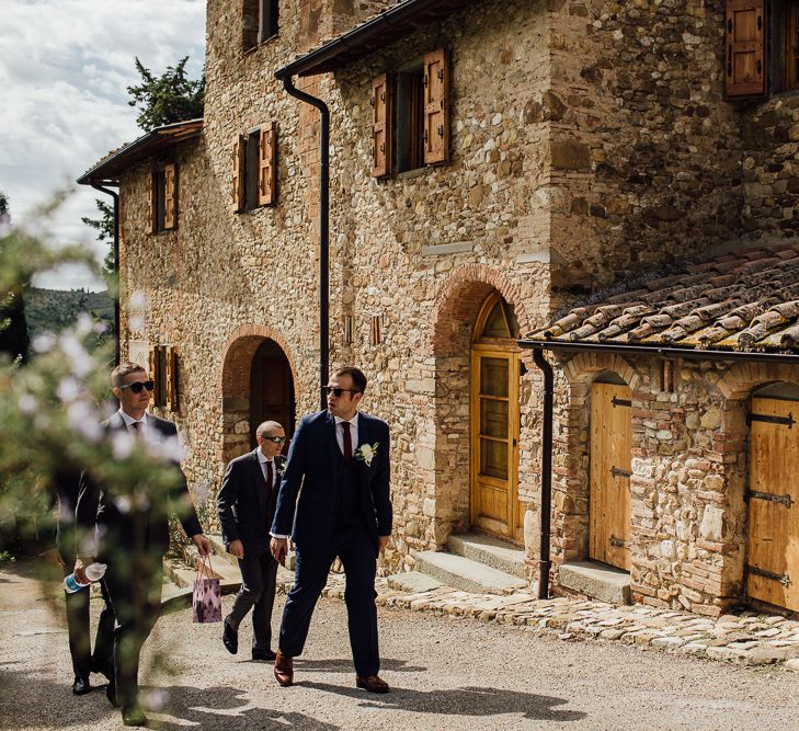 Groom's morning preparations. Destination wedding in Italy. Featuring RMW The List recommended suppliers Wiskow &amp; White and Red on Blonde. Rue de Seine wedding gown with deep red chianti bridesmaid Rewritten dresses.