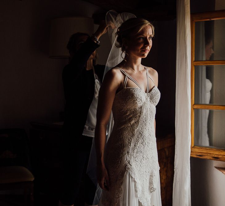 Brides morning preparation. Destination wedding in Italy. Featuring RMW The List recommended suppliers Wiskow &amp; White and Red on Blonde. Rue de Seine wedding gown with deep red chianti bridesmaid Rewritten dresses.