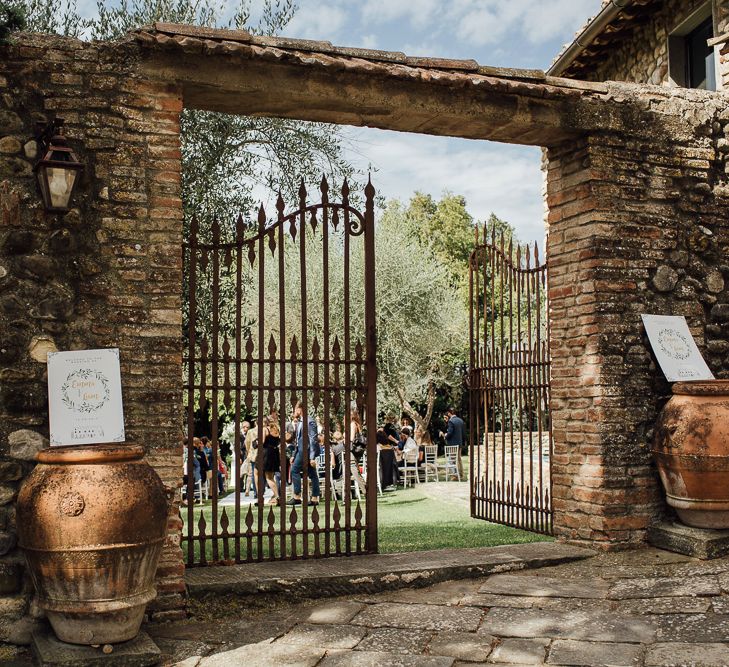 Castle Venue, Castello di Bibbione. Destination wedding in Italy. Featuring RMW The List recommended suppliers Wiskow &amp; White and Red on Blonde. Rue de Seine wedding gown with deep red chianti bridesmaid Rewritten dresses.