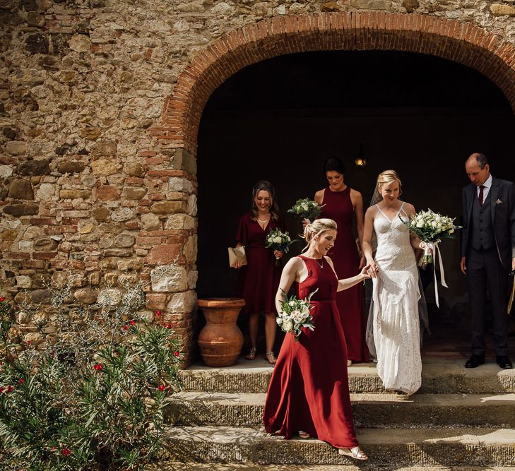 Destination wedding in Italy. Featuring RMW The List recommended suppliers Wiskow &amp; White and Red on Blonde. Rue de Seine wedding gown with deep red chianti bridesmaid Rewritten dresses.