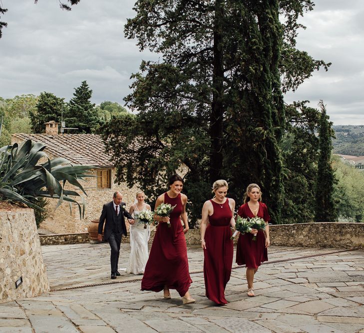 Destination wedding in Italy. Featuring RMW The List recommended suppliers Wiskow &amp; White and Red on Blonde. Rue de Seine wedding gown with deep red chianti bridesmaid Rewritten dresses.