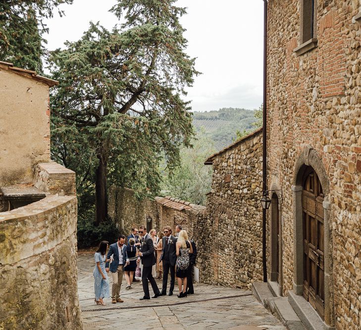 Destination wedding in Italy. Featuring RMW The List recommended suppliers Wiskow &amp; White and Red on Blonde. Rue de Seine wedding gown with deep red chianti bridesmaid Rewritten dresses.