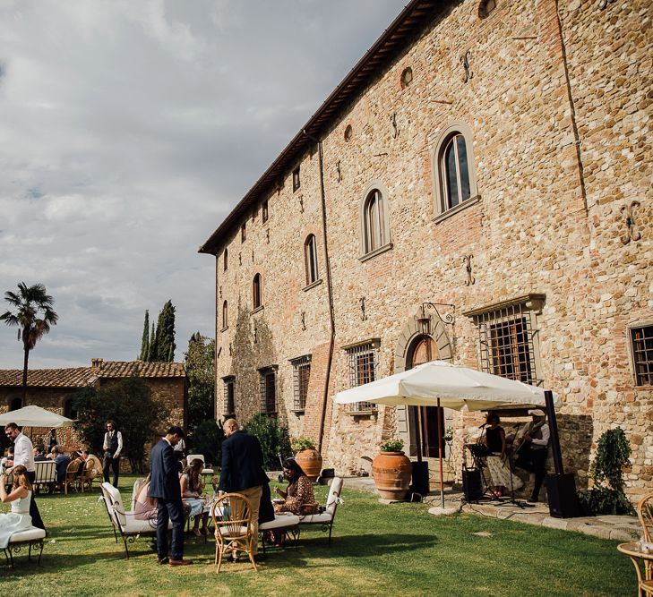 Destination wedding in Italy. Featuring RMW The List recommended suppliers Wiskow &amp; White and Red on Blonde. Rue de Seine wedding gown with deep red chianti bridesmaid Rewritten dresses.