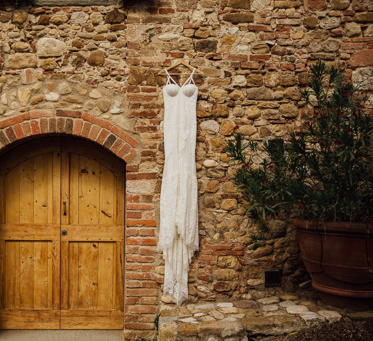 Castle Venue, Castello di Bibbione. Destination wedding in Italy. Featuring RMW The List recommended suppliers Wiskow &amp; White and Red on Blonde. Rue de Seine wedding gown with deep red chianti bridesmaid Rewritten dresses.