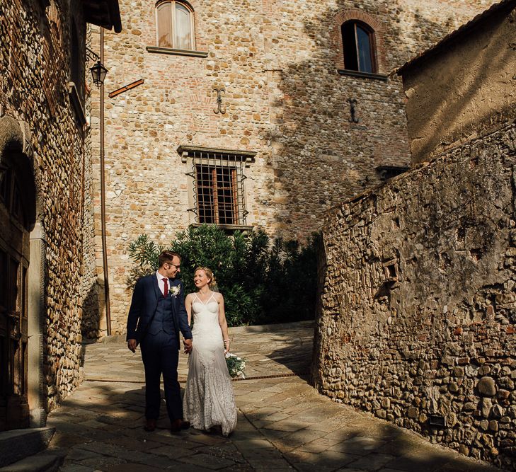 Destination wedding in Italy. Featuring RMW The List recommended suppliers Wiskow &amp; White and Red on Blonde. Rue de Seine wedding gown with deep red chianti bridesmaid Rewritten dresses.