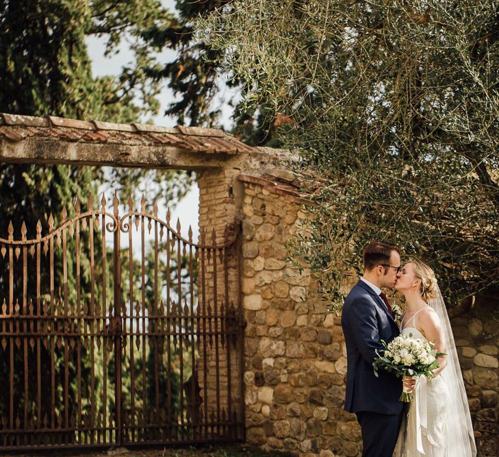 Married in Italy. Destination wedding in Italy. Featuring RMW The List recommended suppliers Wiskow &amp; White and Red on Blonde. Rue de Seine wedding gown with deep red chianti bridesmaid Rewritten dresses.