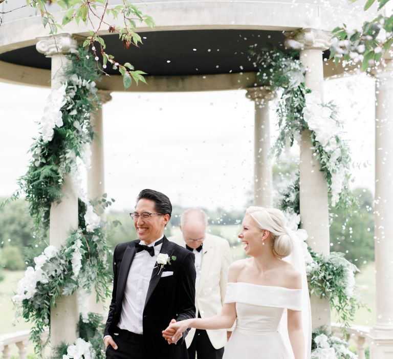 Confetti exit at Froyle Park wedding ceremony