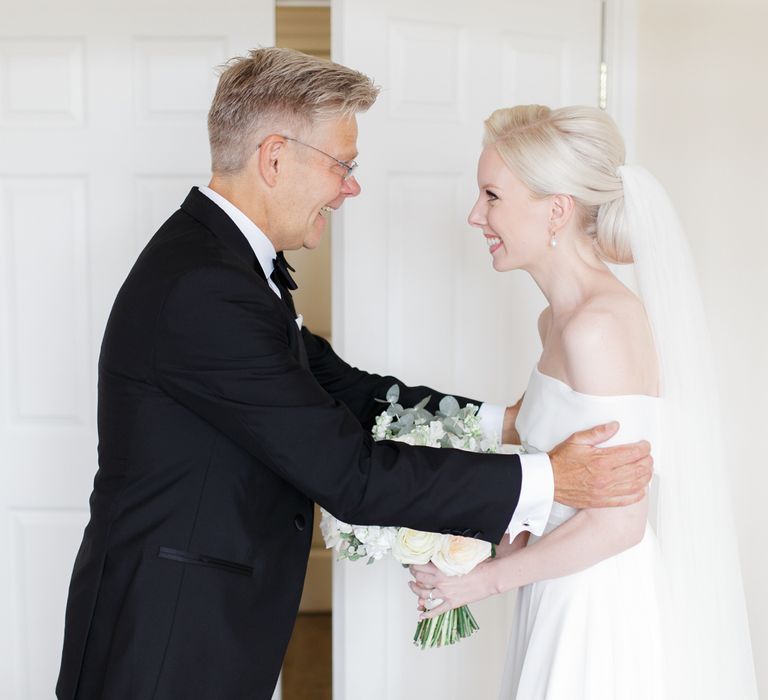 Father of the bride first look with bride in Mori Lee wedding dress